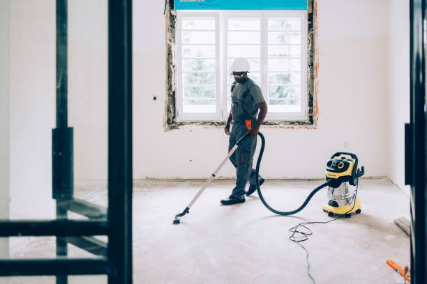imageye imgi 58 african american worker vacuuming floors in an unfinished apartment